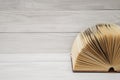 Open book, hardback books on wooden table. Education background. Back to school. Copy space for text Royalty Free Stock Photo