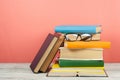 Open book, hardback colorful books on wooden table. Glasses. Back to school. Copy space for text. Education business concept Royalty Free Stock Photo