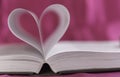 Open book with heart shape Royalty Free Stock Photo