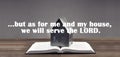 Open book. Holy Bible. Scripture. Miniature house on the book. but as for me and my house, we will serve the LORD On wooden tab Royalty Free Stock Photo