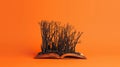 Open book with a miniature burnt forest emerging Royalty Free Stock Photo