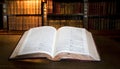 Open book in old library Royalty Free Stock Photo