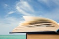 Open book over the landscape background Royalty Free Stock Photo