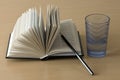 Open book , pen and cup Royalty Free Stock Photo