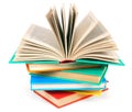 The open book on a pile of multi-coloured books. Royalty Free Stock Photo