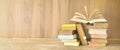 Open Book on a pile of old books, panoarma, good copy space Royalty Free Stock Photo