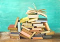 Open book on a pile of old books. Reading, learning, education, literature,copy space Royalty Free Stock Photo