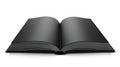 Open book with plain black pages lying on a flat surface Royalty Free Stock Photo
