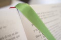 Open Book of Psalms, green bound bookmark over the page Royalty Free Stock Photo