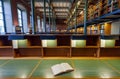 Open book of reader inside the National Library of Sweden with historical interior