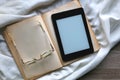 Open Book, Reading Glasses and E-Reader Royalty Free Stock Photo