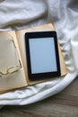 Open Book, Reading Glasses and E-Reader Royalty Free Stock Photo