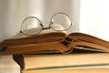 Open Book and Reading Glasses Royalty Free Stock Photo