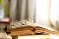 Open Book and Reading Glasses Royalty Free Stock Photo