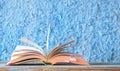 Open book, reading, learning, education, literature concept, close up w. narrow focus Royalty Free Stock Photo