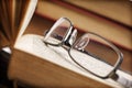 Open book and spectacles Royalty Free Stock Photo