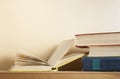 Open book and stack of books on wooden table. Education background. Back to school.Copy space for text. Royalty Free Stock Photo