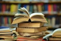 Open book on stack in library Royalty Free Stock Photo