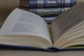 An open book on a table in a library