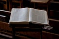 An open book of the Talmud lying on a prayer stand