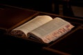 An open book of the Talmud lying on a table. Royalty Free Stock Photo