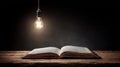 Open Book Under Hanging LightâSymbol of Knowledge, Study, and Enlightenment Royalty Free Stock Photo