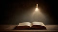 Open Book Under Hanging LightâSymbol of Knowledge, Study, and Enlightenment Royalty Free Stock Photo