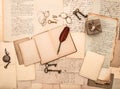 Open book, vintage accessories, letters, documents Royalty Free Stock Photo