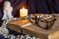 Celebration, still life., cozy homely atmosphere, evening, angel, candles, blanket, book, glasses, autumn, background, brown, cand