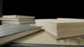 Open book with white paper pages isolated on black studio background. Old books with shabby covers lying on table in the Royalty Free Stock Photo