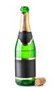 Open bottle of champagne is half empty with a cork on a white. Isolated Royalty Free Stock Photo