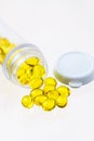 Open bottle of spilled capsule gel pills Royalty Free Stock Photo
