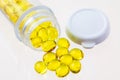 Open bottle of spilled capsule gel pills Royalty Free Stock Photo
