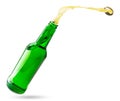 Open bottle with splashes of beer isolated on a white background. Royalty Free Stock Photo