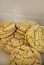 Open box of assorted cookies on a white background