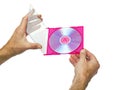 Open box with a DVD in the hands of male Royalty Free Stock Photo