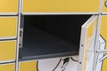 Open box of Inpost parcel locker. WROCLAW, POLAND - April, 2018. 24 hours drop machine called Inpost paczkomat. Automated parcel