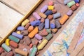 Open box with the remains of the old chalk pastels Royalty Free Stock Photo