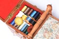 An open box with a selection of sewing materials Royalty Free Stock Photo
