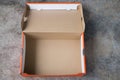 Open brown and orange cardboard box Royalty Free Stock Photo