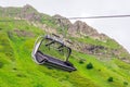 Open cabin lift cable car in the mountains