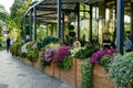 Open cafe with beautiful flowers in Zaryadye Park. Zaryadye is new tourist attraction of Moscow