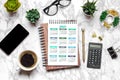 Open Calendar 2021, glasses, cup of coffee, pen, smartphone, succulents on marble table Royalty Free Stock Photo