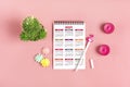 Open Calendar 2021 on tablet, glasses, cup of coffee, pen, smartphone, succulents on marble table Royalty Free Stock Photo