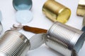 Open cans and a can opener Royalty Free Stock Photo