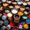 Open cans of paint in many colors, representing diversity and choice