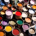 Open cans of paint in many colors, representing diversity and choice Royalty Free Stock Photo