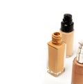 An Open Cap Cosmetic Foundation Bottle on White Background. Liquid Foundation Glass Container.