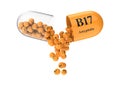 Open capsule with b17 Amygdalin from which the vitamin composition is pouring Royalty Free Stock Photo