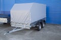 Open car trailer. Trailer for passenger cars.Sale, rental and maintenance of trailers Royalty Free Stock Photo